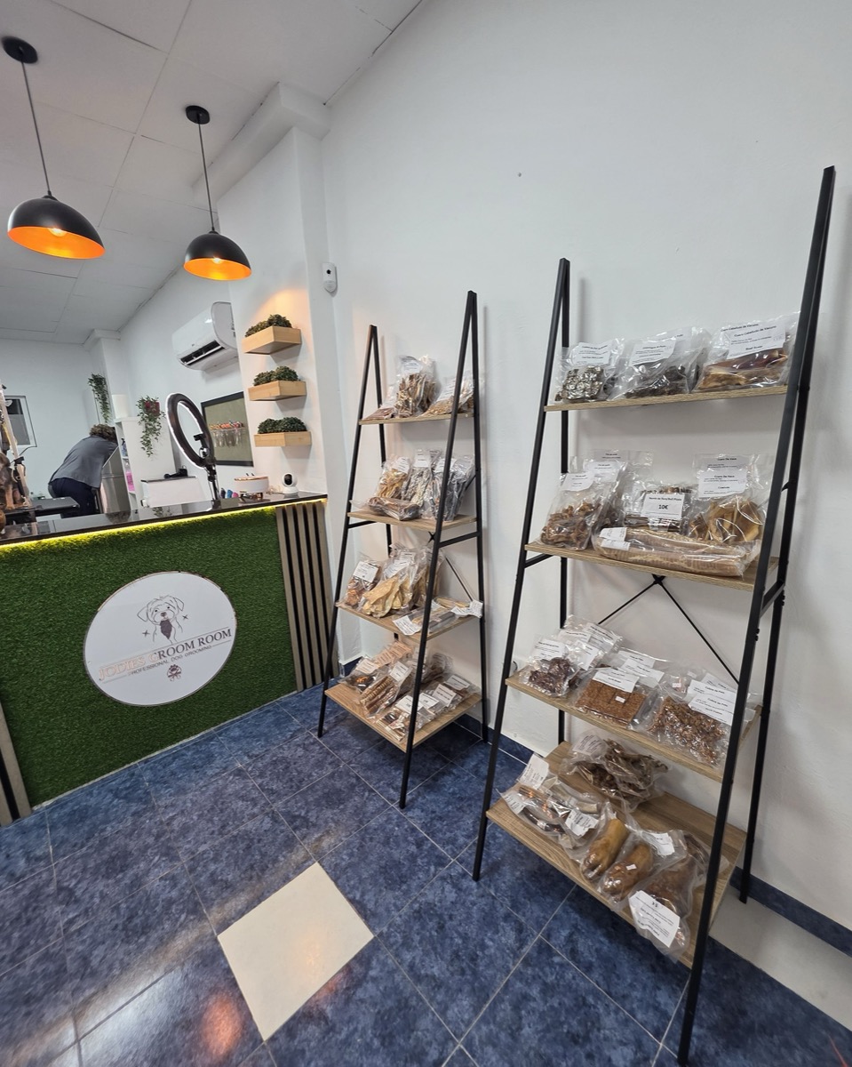 Natural dog treats and chews display inside Jodie's Groom Room salon